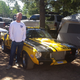 I don’t remember who that is but the car is awesome.